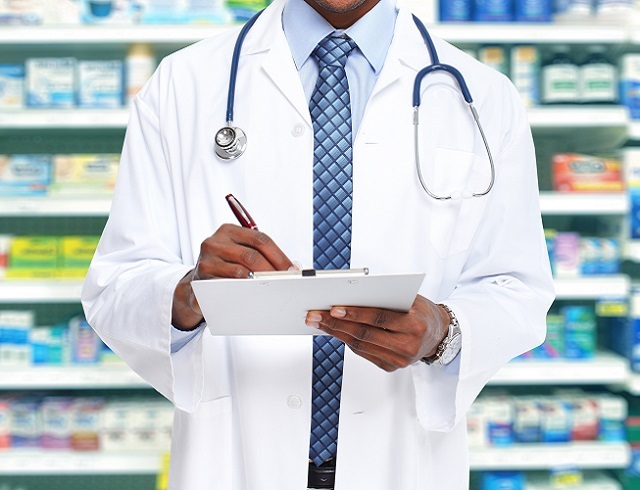 Doctor with stethoscope and medicine